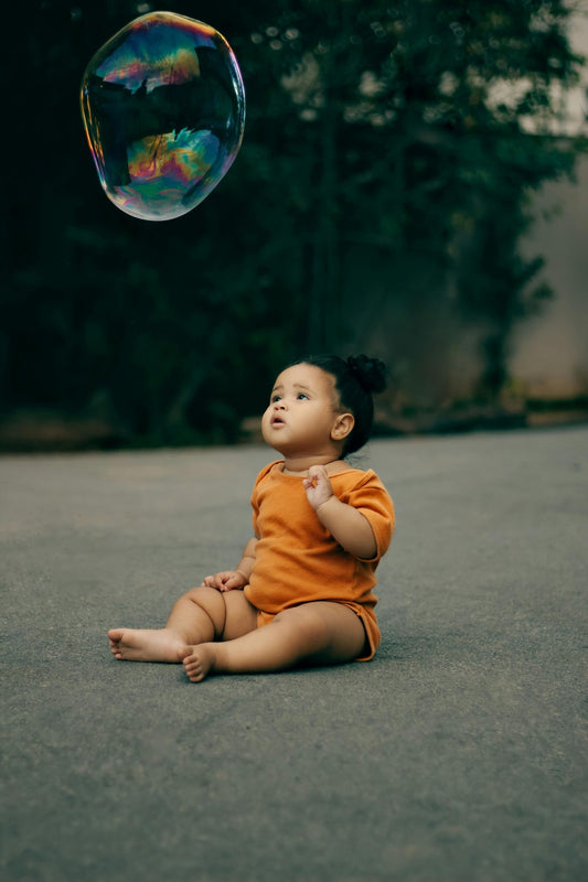 How To Make Homemade Bubbles with Your Child Using a Learning Tower - Little Treasures